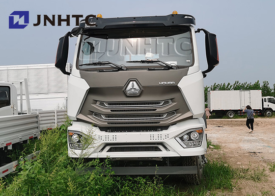 Camions arrières plats de Sinotruk 8x4 Hohan 31tons Lhd avec l'axe de levage