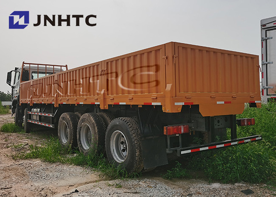 Camions arrières plats de Sinotruk 8x4 Hohan 31tons Lhd avec l'axe de levage