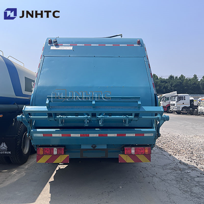 Howo SITRAK 4*2 chargeur arrière camions à ordures compressés camions à ordures