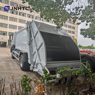 Compacteur de déchets 4x2 Euro 2 Élimination des déchets Chargeur arrière de déchets Camion vert Diesel Modèle nouveau