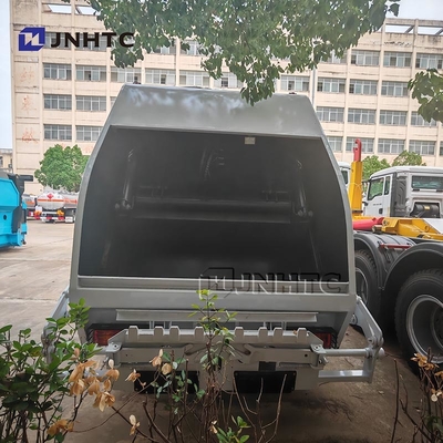Compacteur de déchets 4x2 Euro 2 Élimination des déchets Chargeur arrière de déchets Camion vert Diesel Modèle nouveau