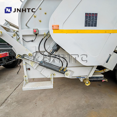 Howo NX 15 CBM Compacteur de déchets Camion de chargement arrière Camion de déchets comprimé