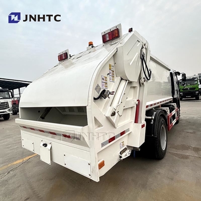 HOWO Chariot de déchets légers 10 M3 4X2 Chariot compacteur de déchets de petite taille