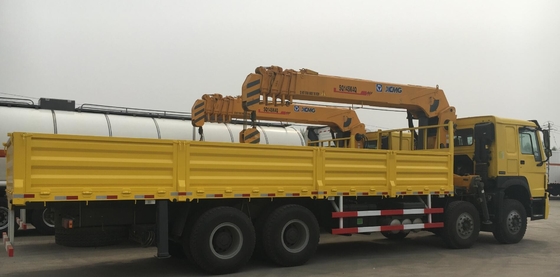 Le camion de cargaison de Howo 8x4 a monté la grue 12ton à la performance de 20 tonnes d'hauteur