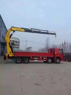 Le camion de cargaison de Howo 8x4 a monté la grue 12ton à la performance de 20 tonnes d'hauteur