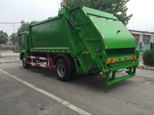 SINOTRUK HOWO 4*2 a rendu le camion compact de compacteur des déchets 12m3
